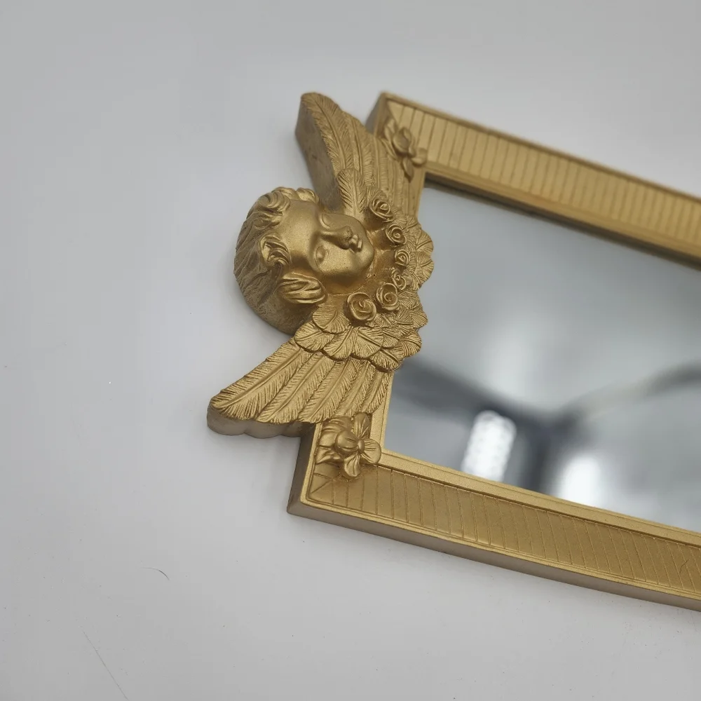 Vintage gold 80s Hollywood Regency Cherub Angel Figural Wall Mirror guilded
